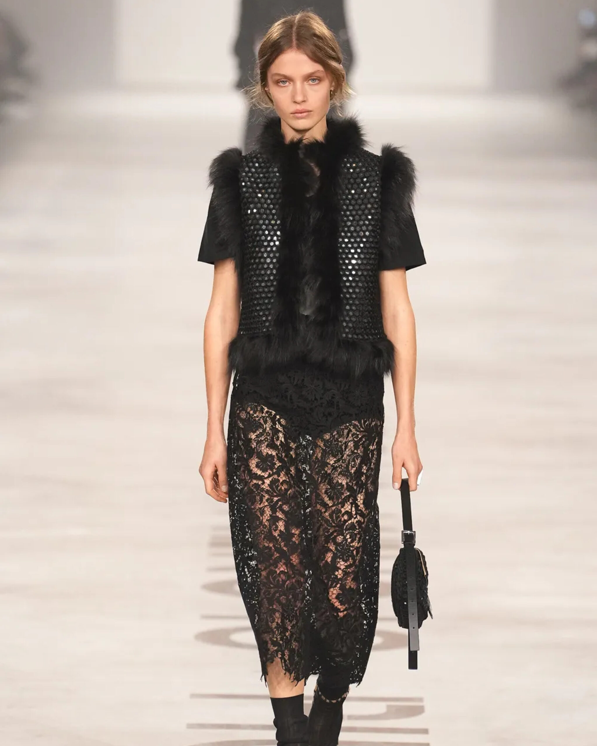 Defining the key elements”: At Fendi, Maria Grazia Chiuri debuts her pragmatism